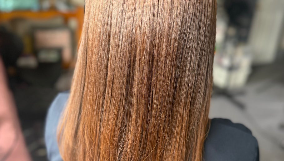 Smooth, shiny hair styled at MariahCharm Simplicity Beauty in Auckland, Auckland, NZ for a sleek look.