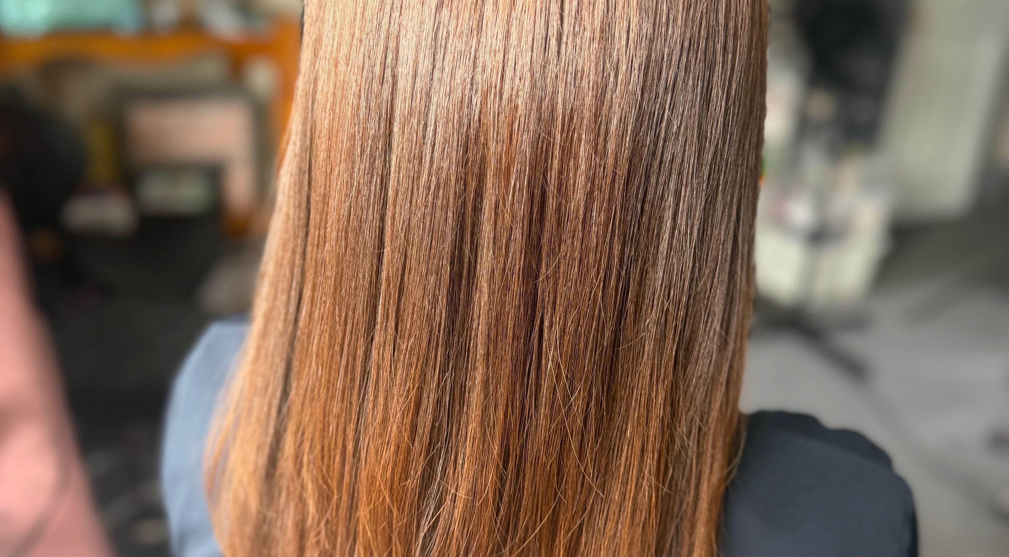 Smooth, shiny hair styled at MariahCharm Simplicity Beauty in Auckland, Auckland, NZ for a sleek look.