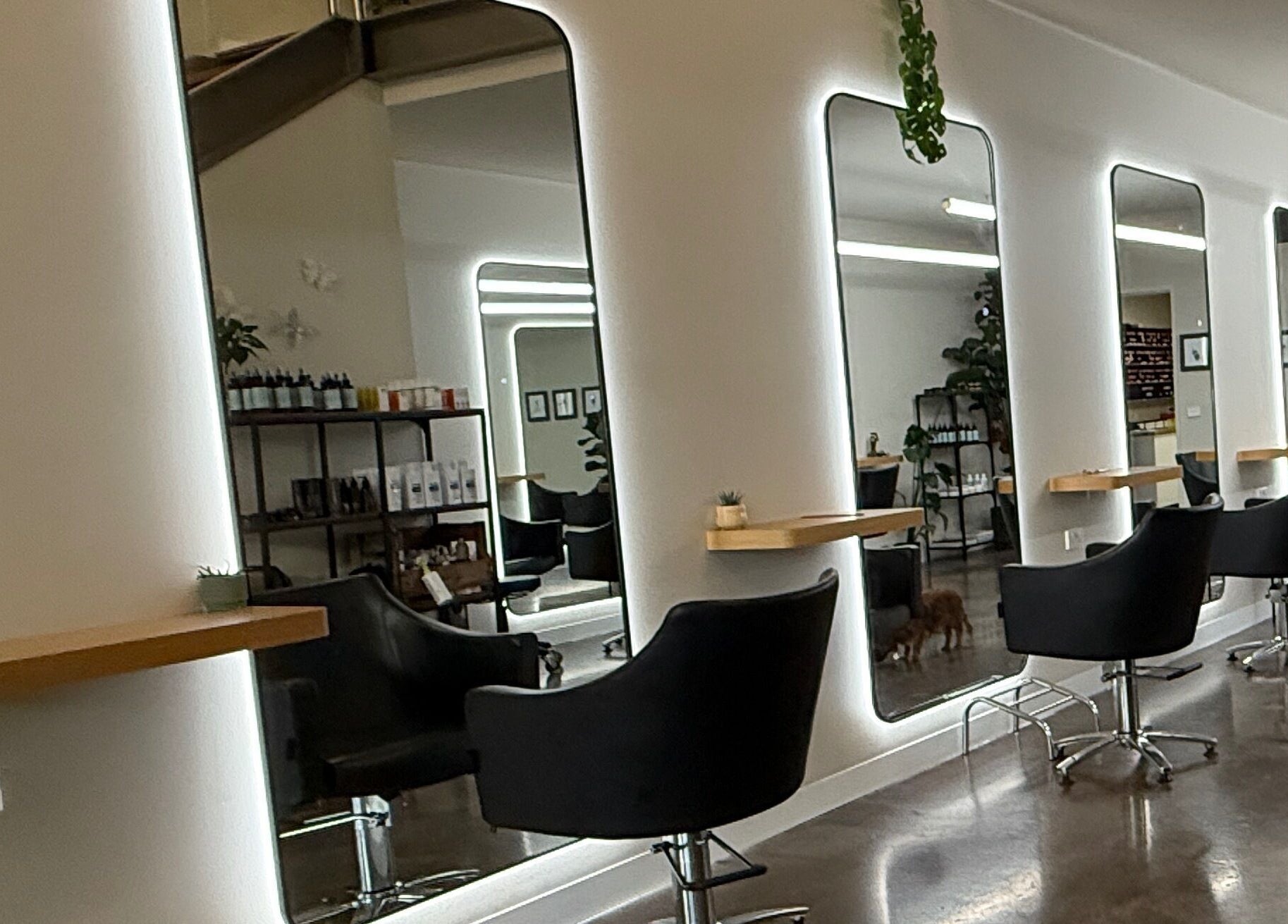 Chic salon interior with mirrors and chairs at Biba Croydon in Melbourne, Victoria, AU.