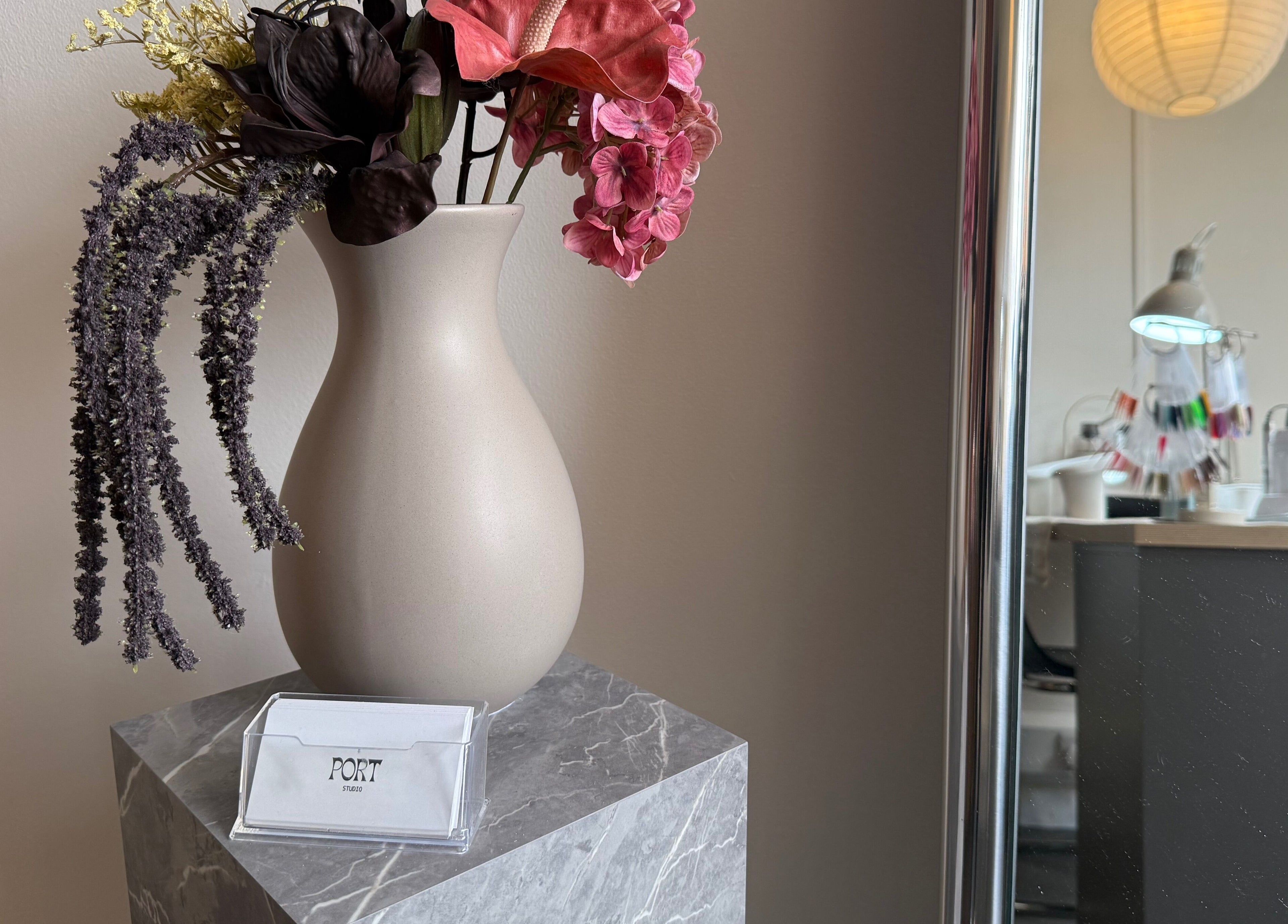 Elegant flower vase at Port Studio, Stockport, England, GB, enhancing the beauty and wellness ambiance.