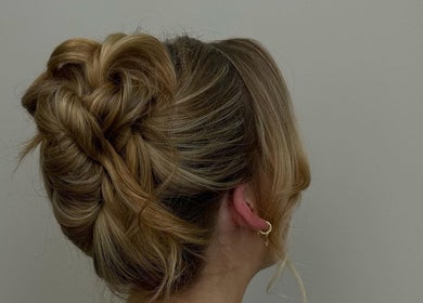 Intricate updo hairstyle at Jacqueline Louise Hair in Sydney, New South Wales, AU showcasing braiding artistry.