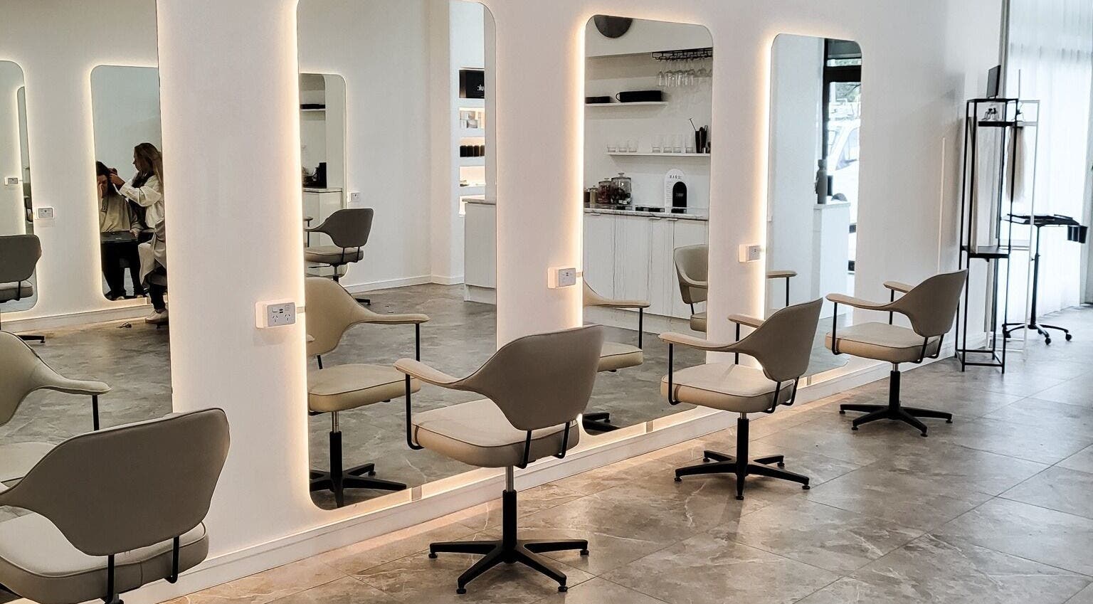 Sleek salon interior at Maiden Hair Extensions, Kilsyth VIC, AU with modern mirrored stations.