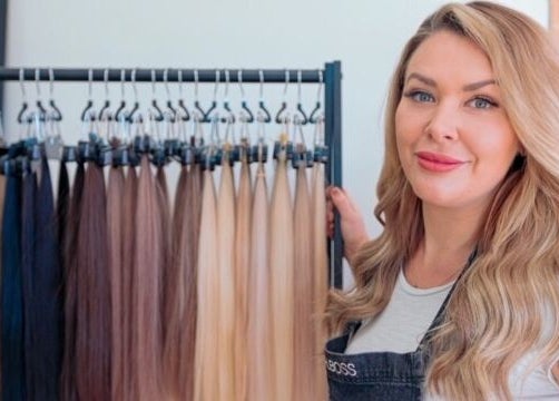 Stylish hair professional displaying extensions at Maiden Hair Extensions, Kilsyth, VIC, AU.