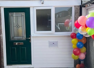 HJ Beauty entrance with colorful balloons in Warrington, England, GB