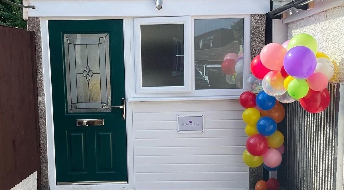 HJ Beauty entrance with colorful balloons in Warrington, England, GB