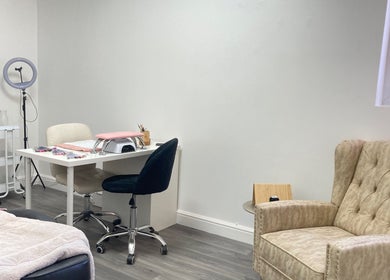 Cozy nail station at Summers Nails, Kidsgrove, England, GB, featuring plush seating and modern equipment.