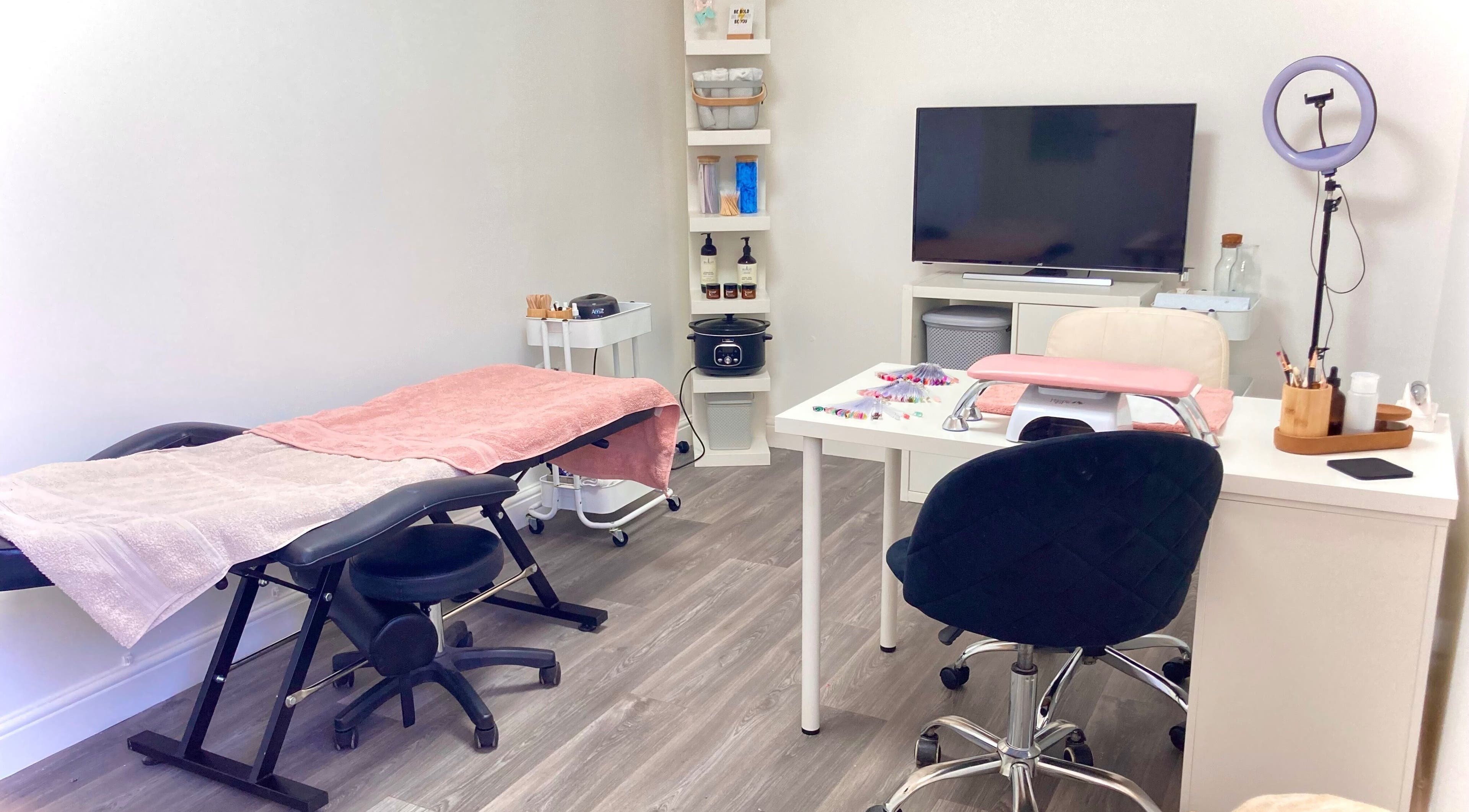 Chic nail studio interior at Summers Nails, Kidsgrove, England, GB featuring cozy treatment station.