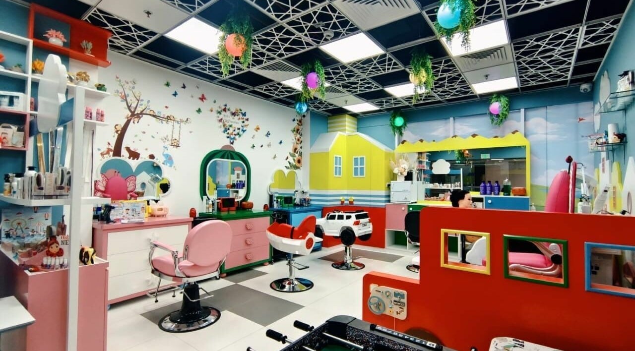 Vibrant interior of Notty Monkeys Kids Salon LLC in Al Barari, Dubai, AE, featuring colorful, child-friendly decor.