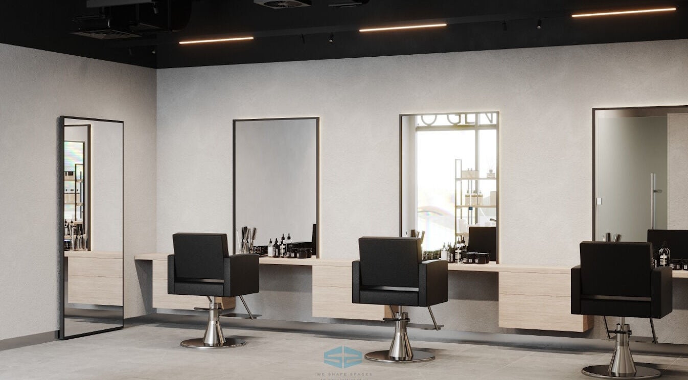 Interior of BROUSE. Gents Salon, Dubai, AE with sleek black chairs and mirrors in a stylish setting.