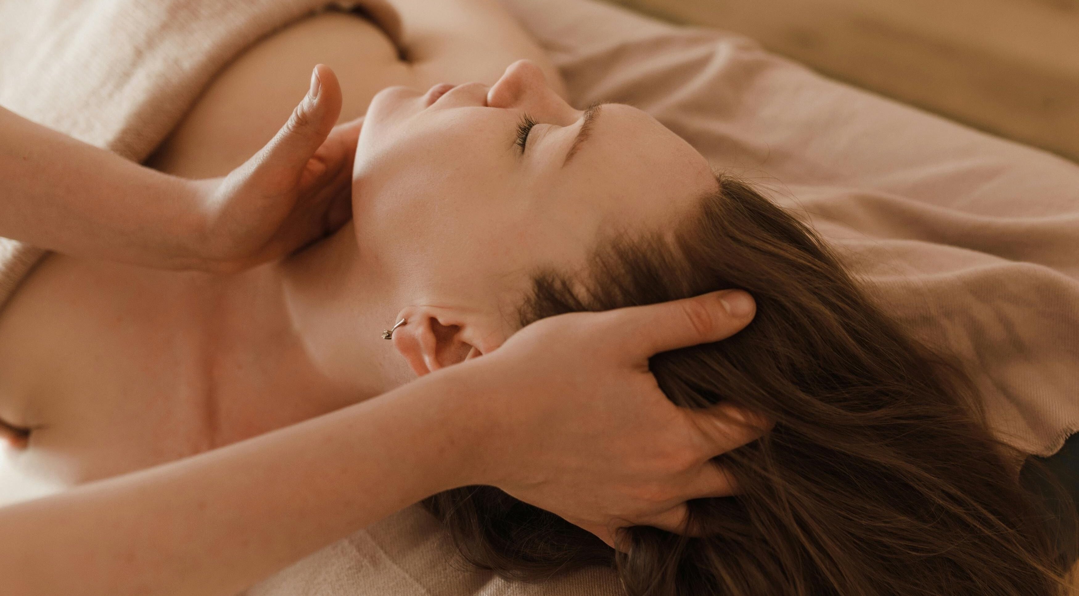 Relaxing head massage at G Beauty Place, Perth, Scotland, GB for a soothing wellness experience.