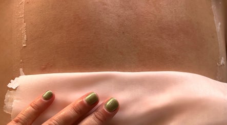 Waxing treatment in progress at G Beauty Place, Perth, Scotland, GB, offering smooth skin results.