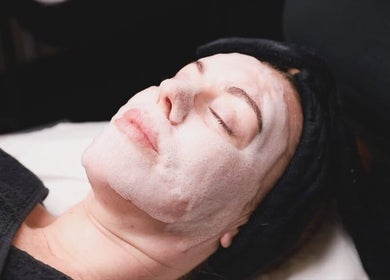 Calming facial treatment in progress at G Beauty Place, Perth, Scotland, GB spa facility.