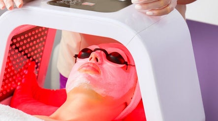 LED facial therapy at IQ Derma Cape Town, Western Cape, ZA enhances skin rejuvenation with soothing glow.