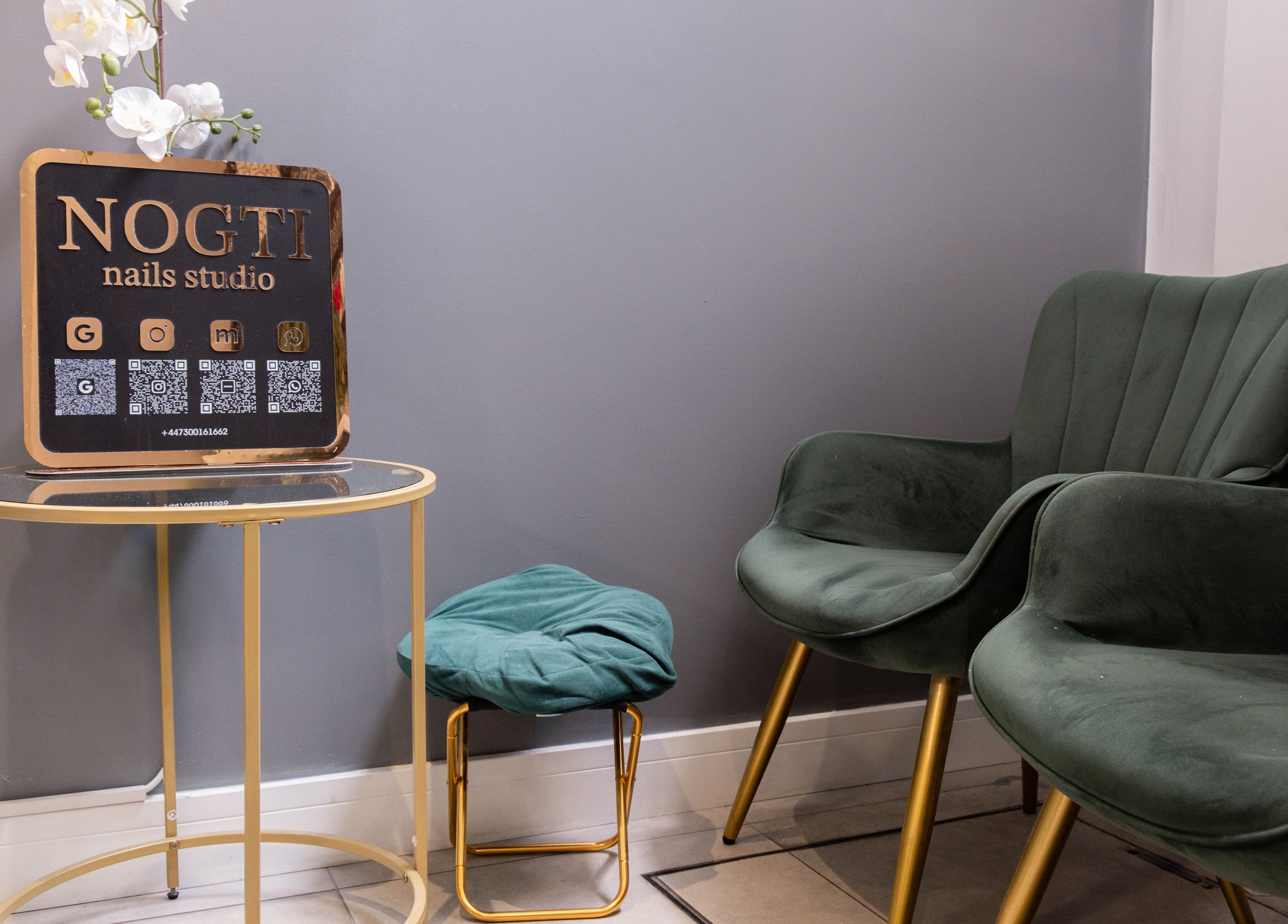 Cozy seating area at Nogti Nails Studio Fulham, London, England, GB with stylish decor.
