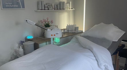 Relaxing treatment room at Skin Effect, Christchurch, Canterbury, NZ, featuring a comfortable spa bed and skincare tools.