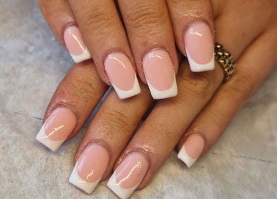 Elegant French manicure at Celestial Nails Balloch, Balloch, Scotland, GB showcasing classic style.