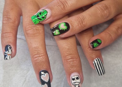 Vibrant Halloween-themed nail art at Celestial Nails Balloch, Balloch, Scotland, GB.