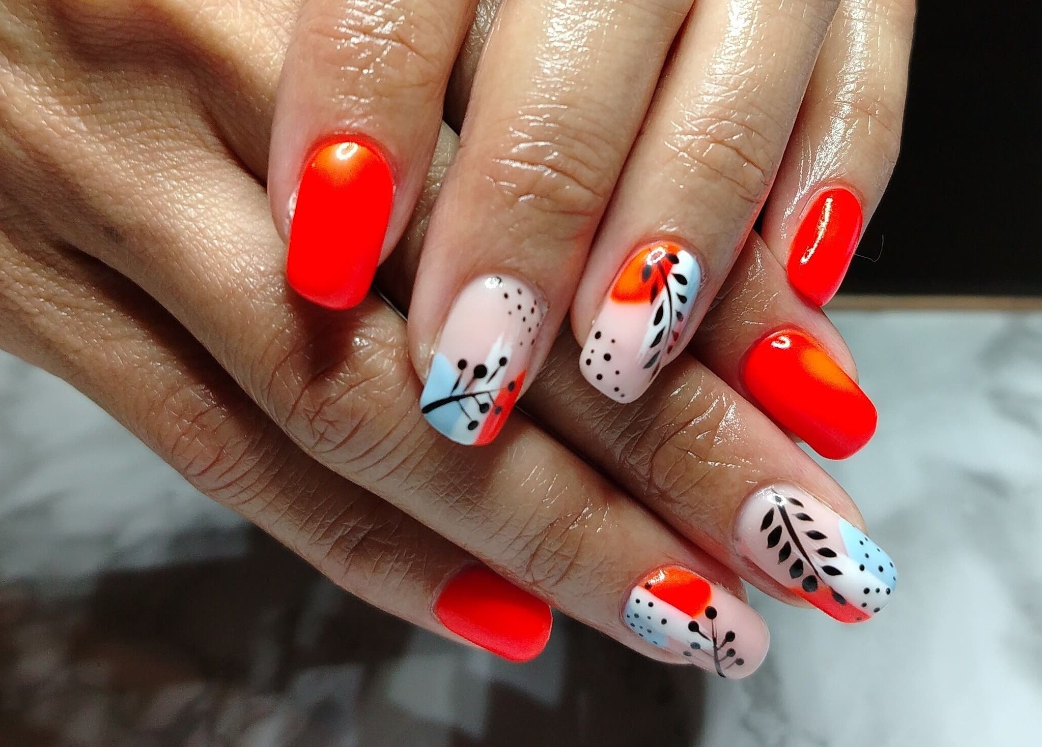 Colorful nail art at Nailed by Lue in Riversdale, Western Cape, ZA. Bright and intricate designs.