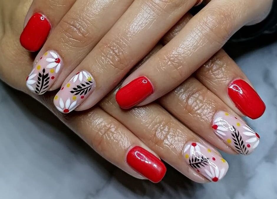 Beautiful floral nail art with red accents by Nailed by Lue, Riversdale, Western Cape, ZA.
