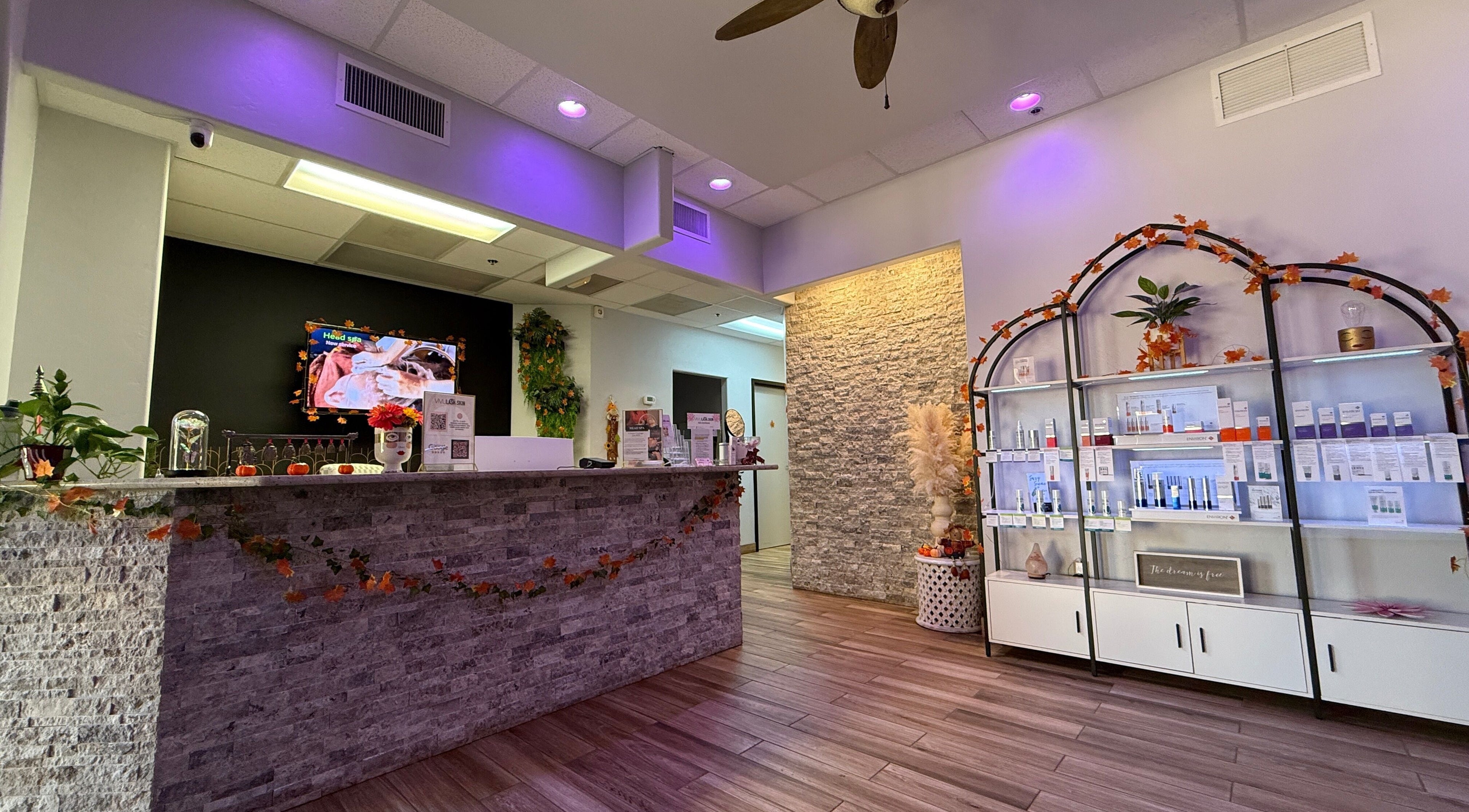 Welcoming interior of Vivu Lash & Skin in Tucson, Arizona, US, showcasing calming decor and product display.