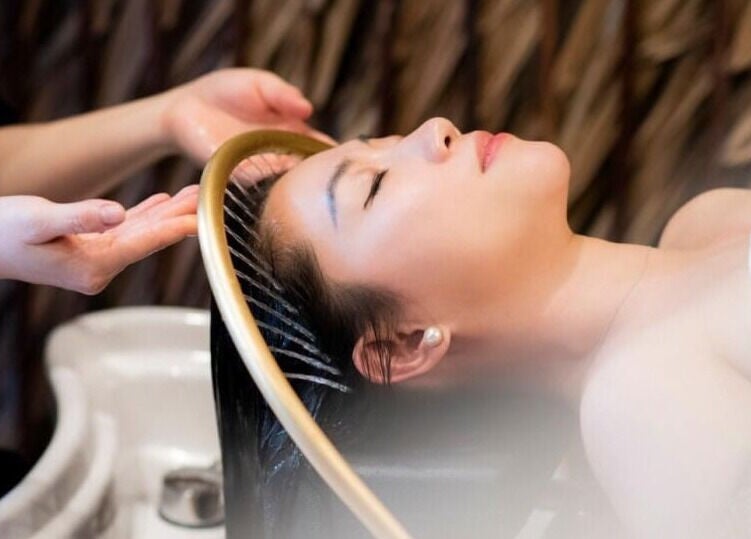 Relaxing hair wash treatment at Vivu Lash & Skin, Tucson, Arizona, US, offering serene beauty and wellness.