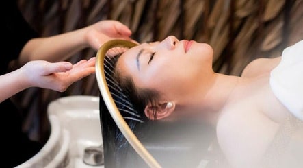 Relaxing hair wash treatment at Vivu Lash & Skin, Tucson, Arizona, US, offering serene beauty and wellness.