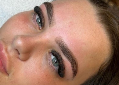 Close-up of expertly shaped brows and lashes at The Glow Hub in Black Notley, England, GB.