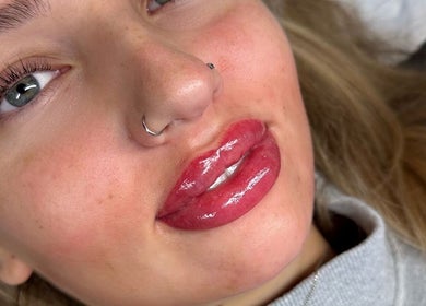 Close-up of glossy lips at The Glow Hub, Black Notley, England, GB.