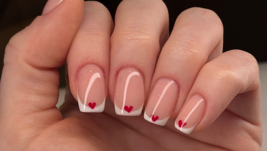 Beautiful French manicure with heart design at Be Beautiful by Gee, Cheltenham, England, GB.