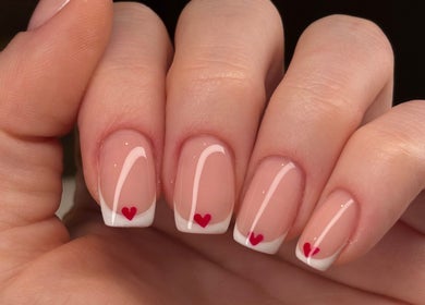 Beautiful French manicure with heart design at Be Beautiful by Gee, Cheltenham, England, GB.