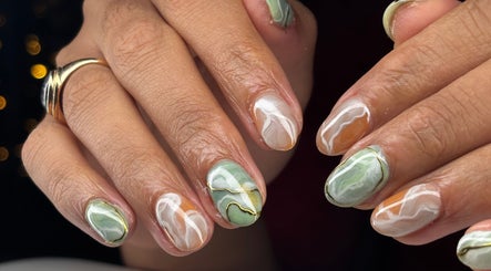Elegant marble nail art at Be Beautiful by Gee in Cheltenham, England, GB showcasing intricate design.