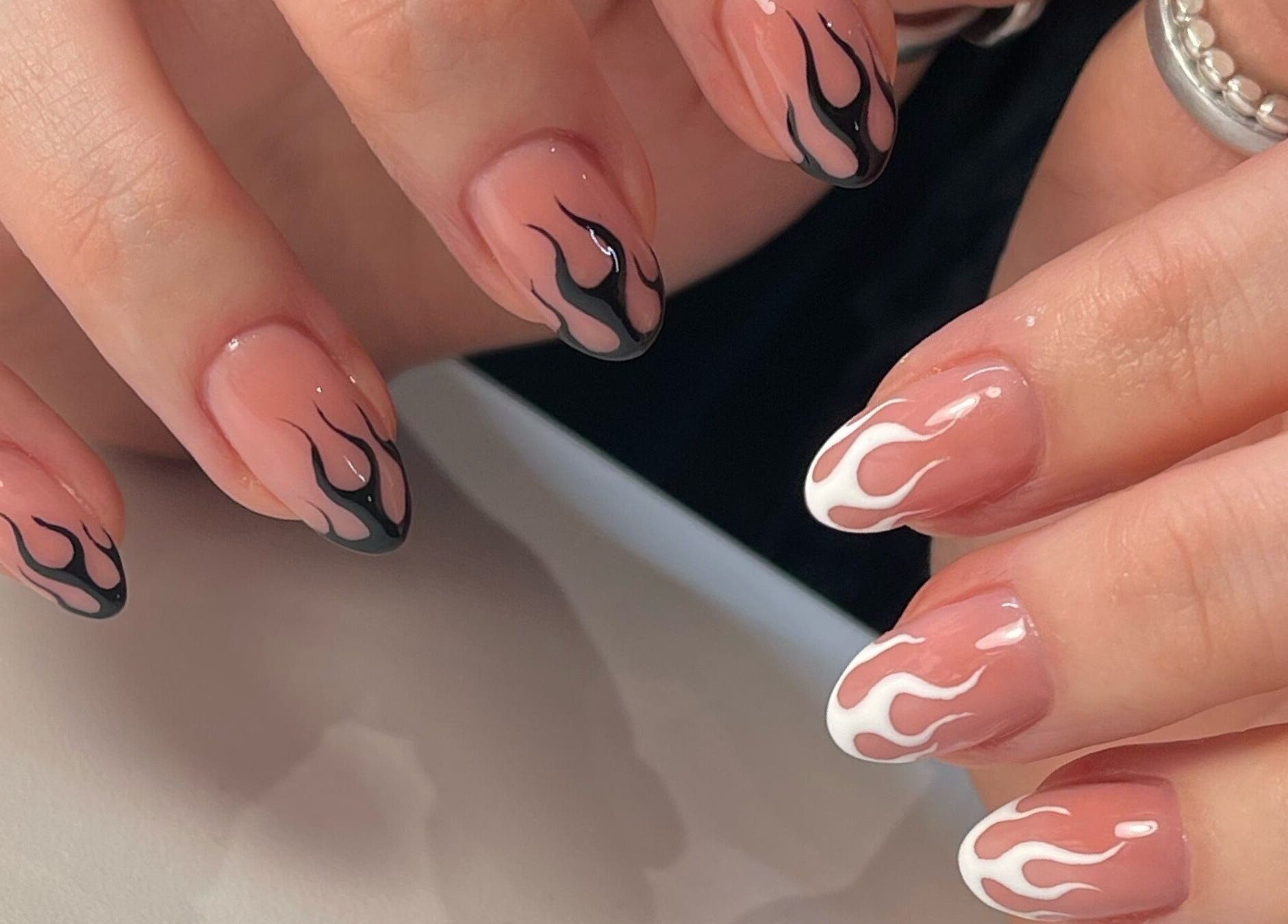 Stylish flame nail art at Cured by Beth, Edinburgh, Scotland, GB. Modern and chic manicure design.
