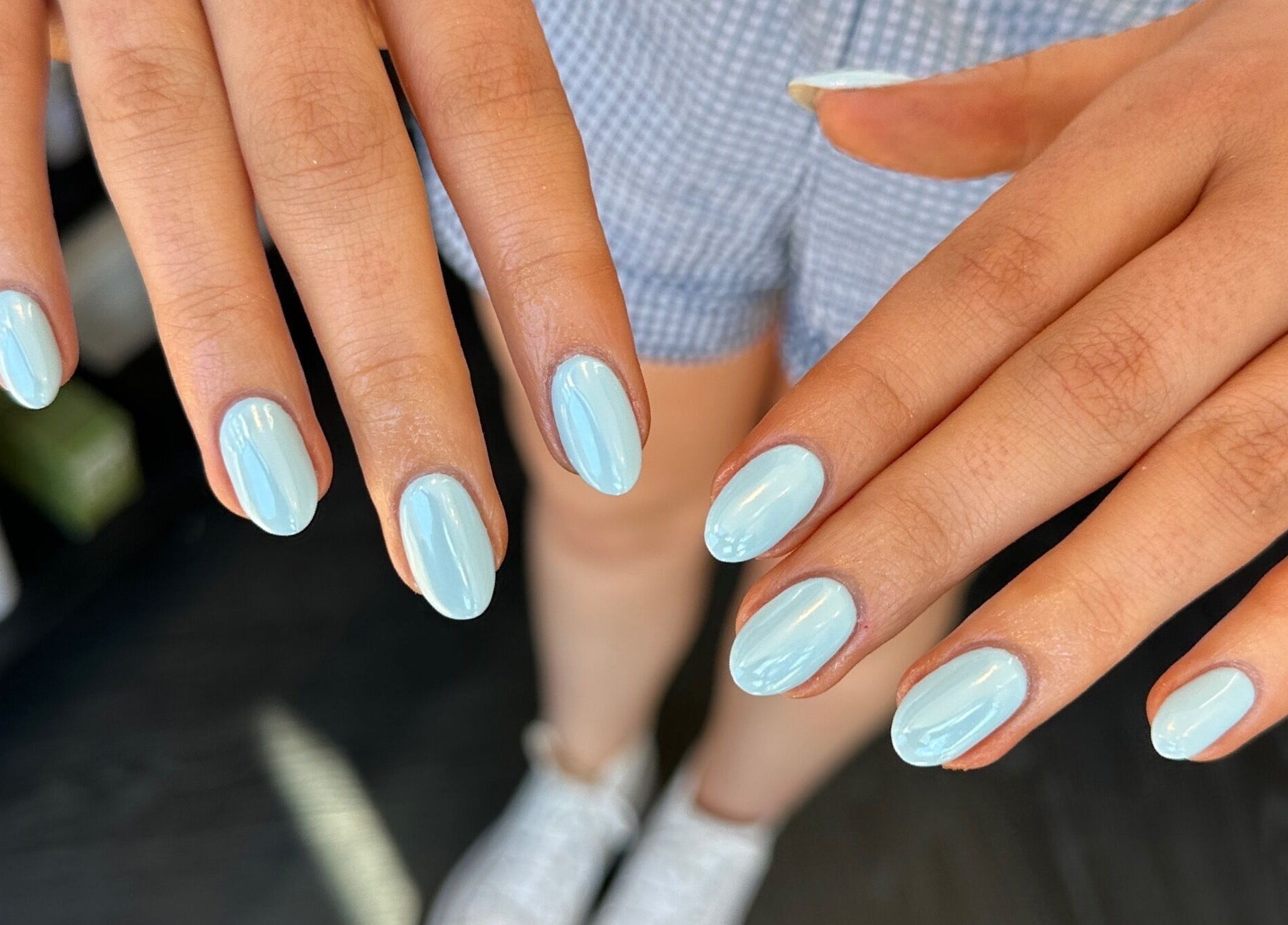Fresh sky-blue manicure at Cured by Beth in Edinburgh, Scotland, GB, showcasing elegant nail care.