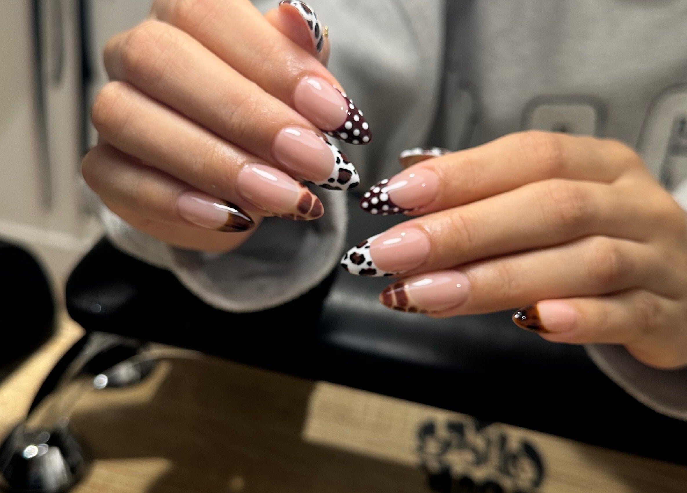 Intricate nail art design at Cured by Beth, Edinburgh, Scotland, GB, featuring elegant patterns.