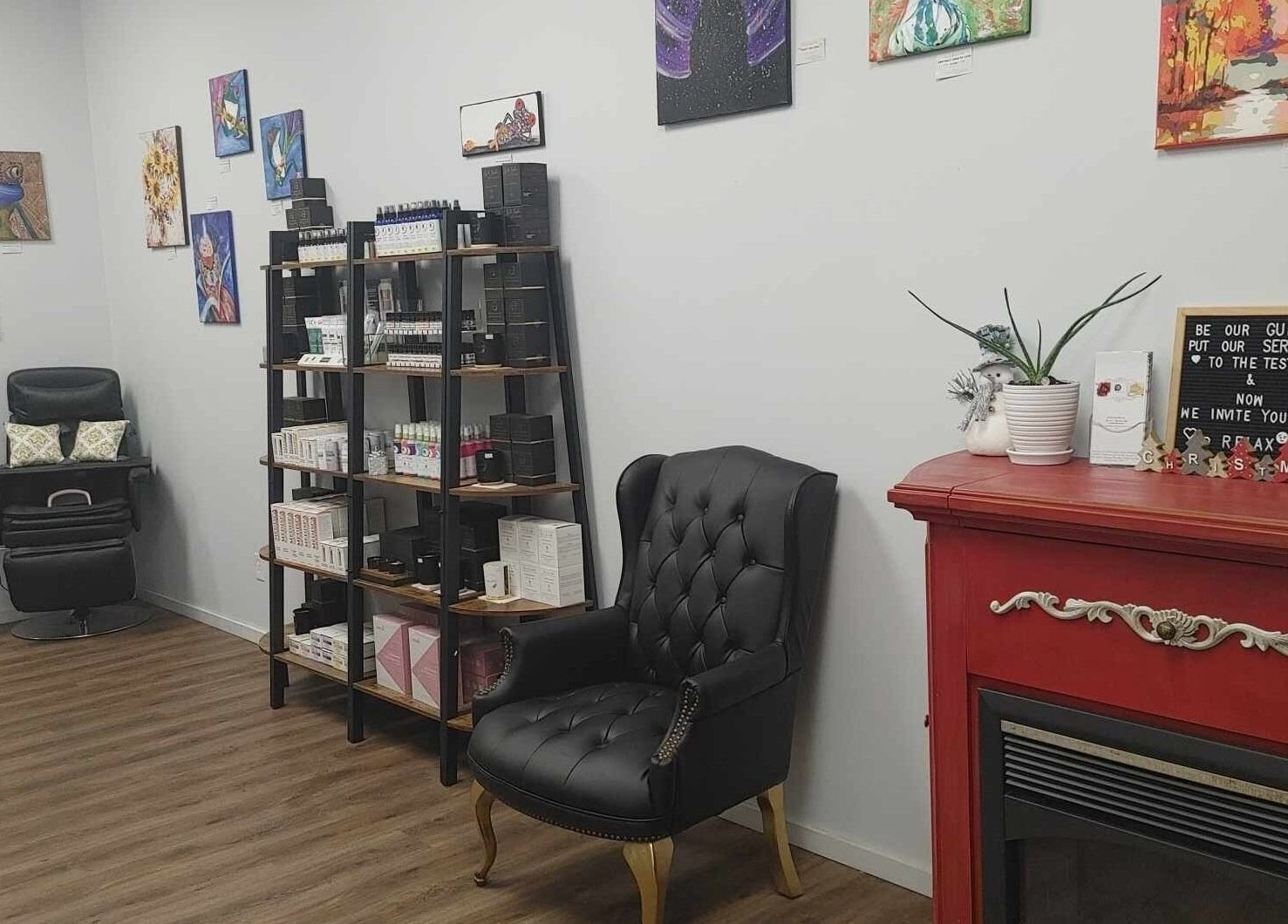 Elegant seating area at Beast 2 Beauty Bar (Medi-Spa) in Williams Lake, British Columbia, CA. Art and decor enhance ambiance.