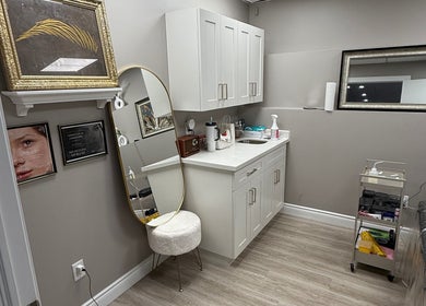 Elegant treatment room at Brows With Shelbs, Hamilton, Ontario, CA with modern decor and beauty essentials.