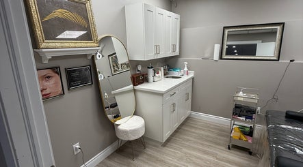 Elegant treatment room at Brows With Shelbs, Hamilton, Ontario, CA with modern decor and beauty essentials.