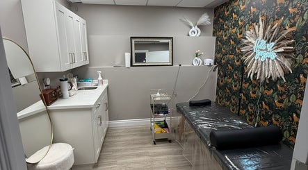Sleek treatment room at Brows With Shelbs, Hamilton, Ontario, CA with elegant decor and modern amenities.