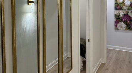 Elegant hallway with mirrors at ILash by Lupe, Knoxville, Tennessee, US.