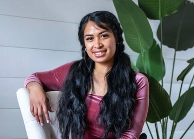 Professional at ILash by Lupe, Knoxville, Tennessee, US, in a relaxed setting with lush greenery.