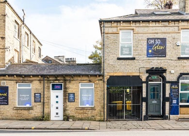 Front view of Oh So Glow in Halifax, England, showcasing welcoming entrance and signage.