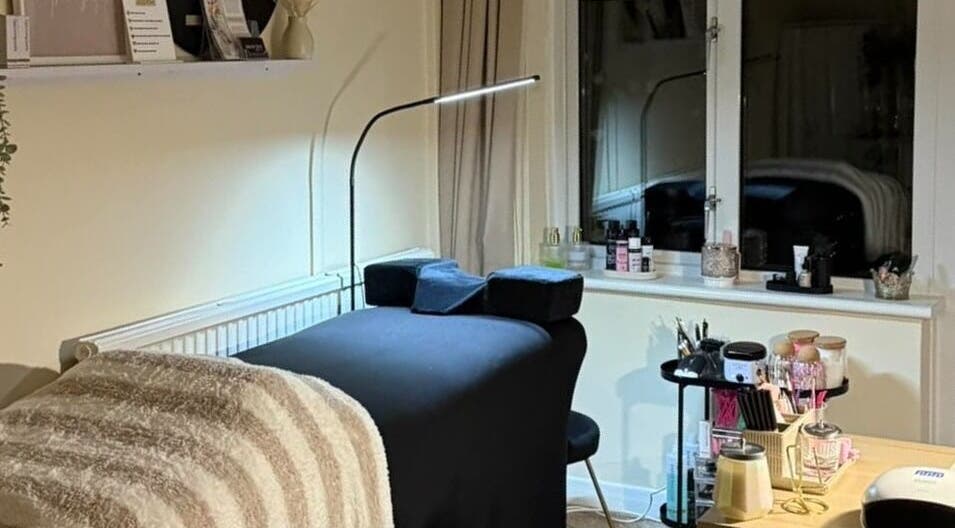 Relaxing treatment room at Megan Hamill Beauty Co. in Lisburn, Northern Ireland, GB, with spa bed and tools.
