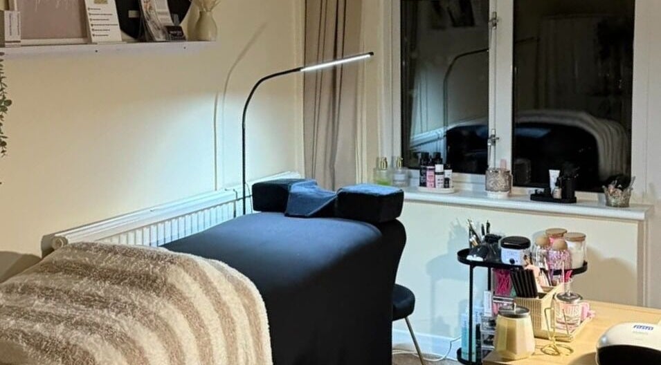 Relaxing treatment room at Megan Hamill Beauty Co. in Lisburn, Northern Ireland, GB, with spa bed and tools.