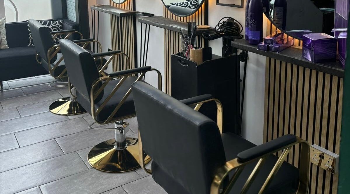Elegant salon chairs at Black & Bamber, Hull, England, GB, creating a sleek and modern styling area.
