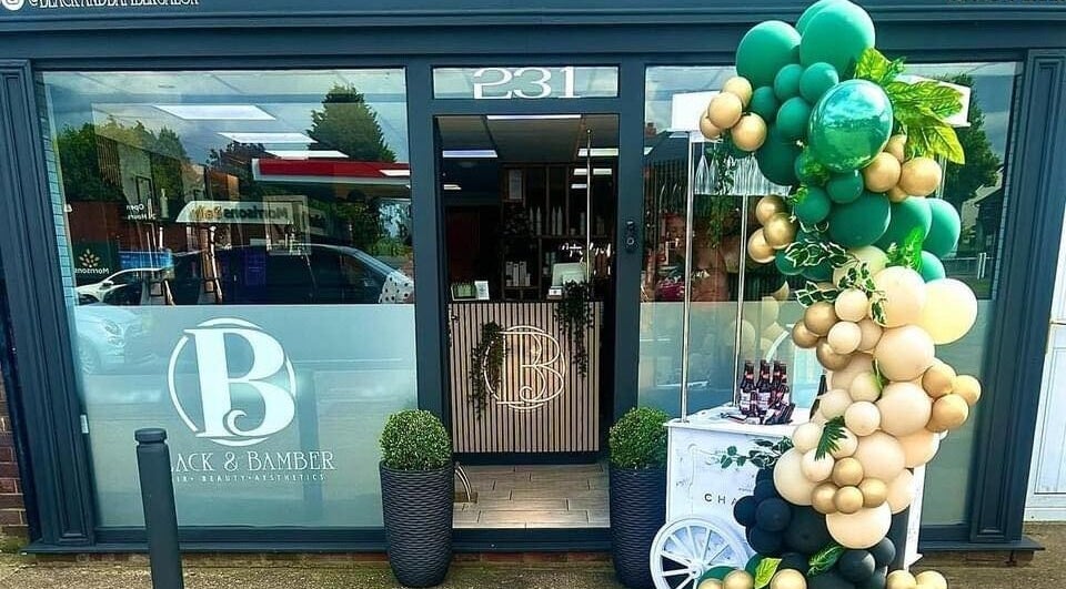 Front view of Black & Bamber in Hull, England, with decorative balloons and modern design.