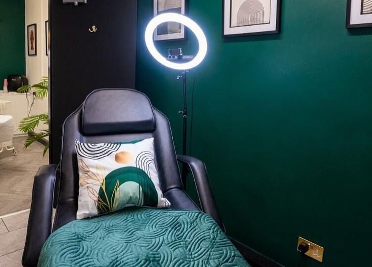 Relaxing treatment room at Black & Bamber in Hull, England, GB with plush chair and elegant decor.