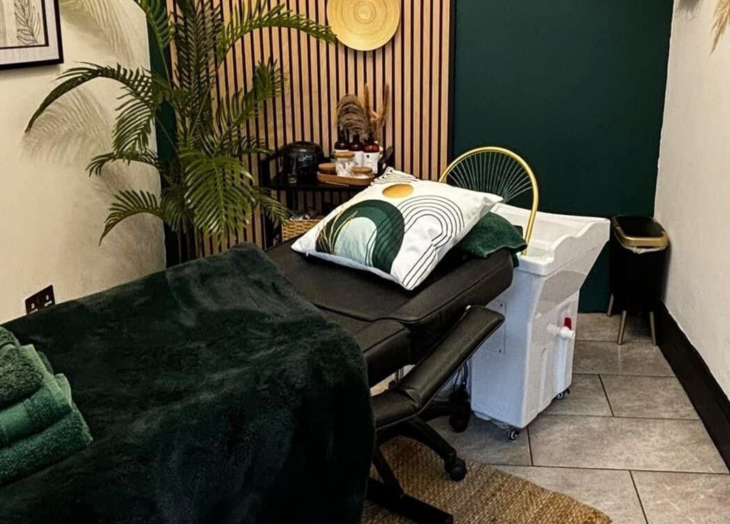 Therapy room at Black & Bamber in Hull, England, GB, featuring a massage table and calming decor.