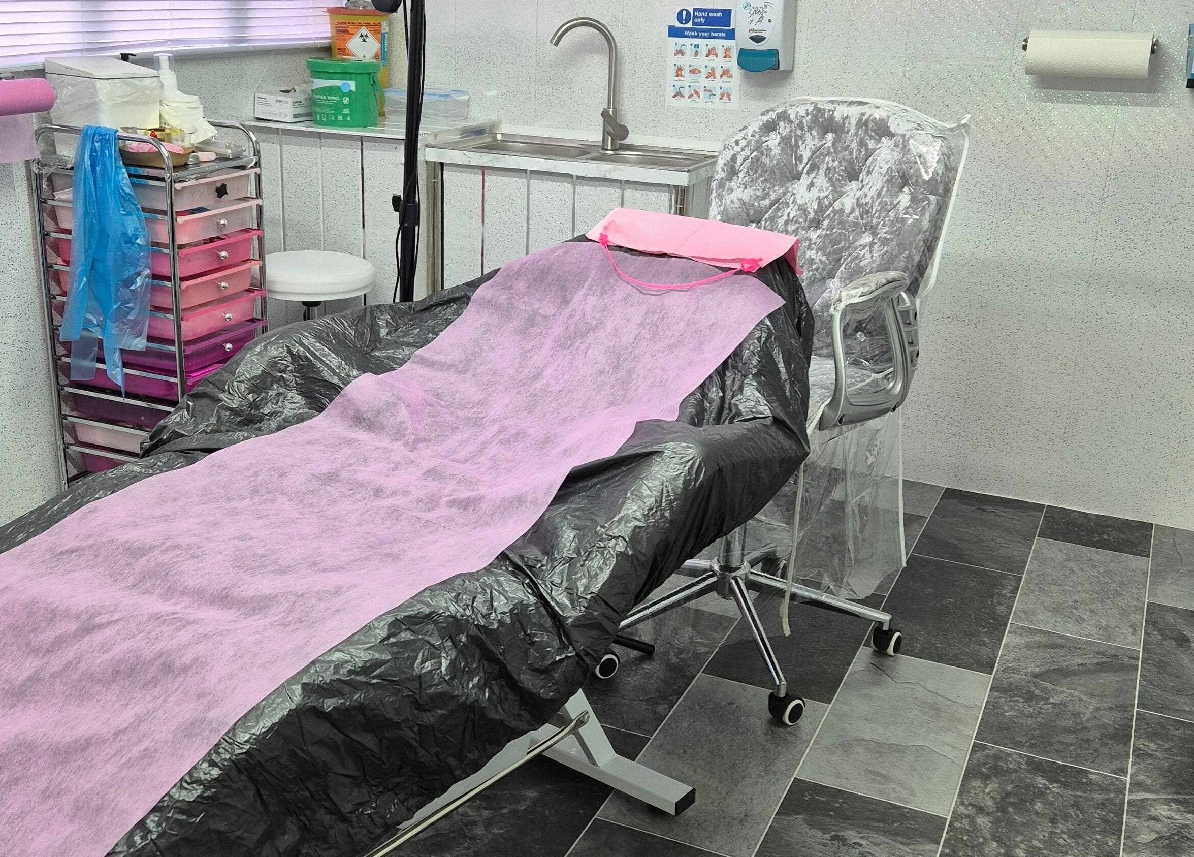 Treatment bed at Skin-Finity in Aylesham, England, GB ready for beauty and wellness sessions.