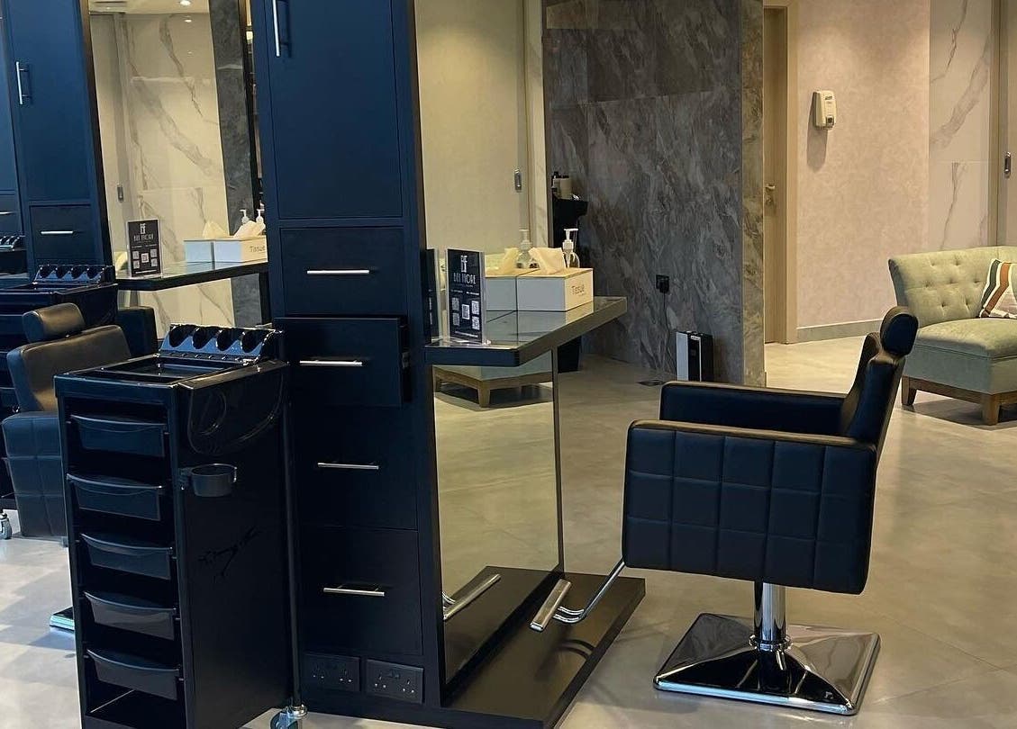 Chic modern salon interior at Bel Fiore Ladies Salon, Abu Dhabi, Abu Dhabi, AE, showcasing elegant black chairs.