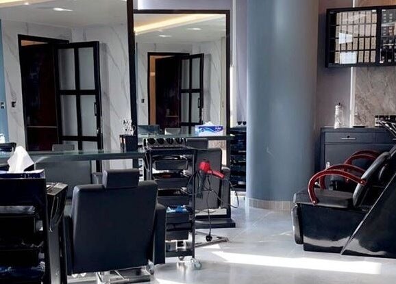 Modern styling chairs and hairdressing stations at Bel Fiore Ladies Salon, Abu Dhabi, Abu Dhabi, AE.